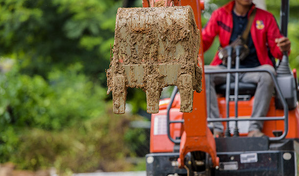 Photo of a digger's toothed bucket